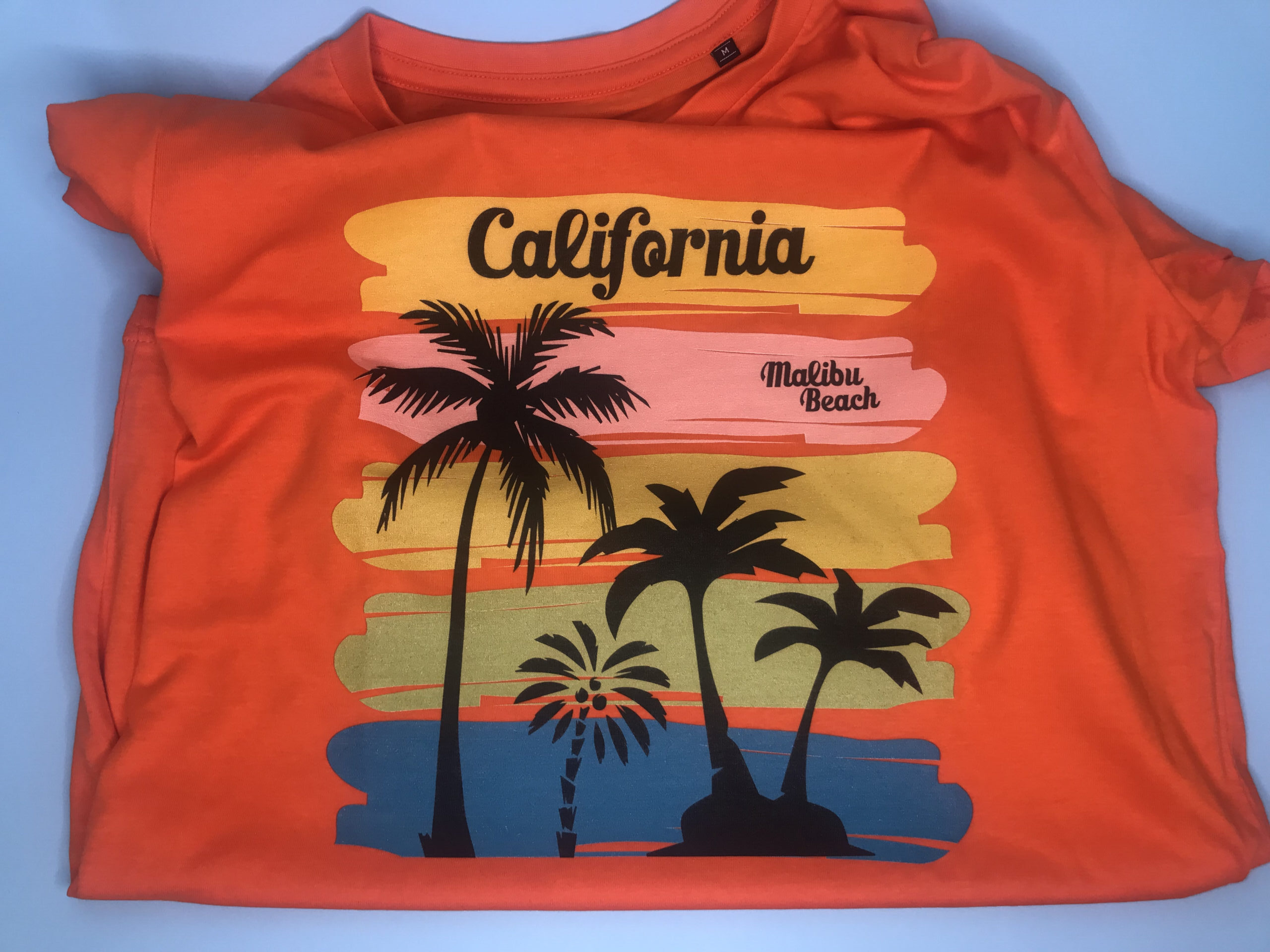 stampa california su maglia arancione